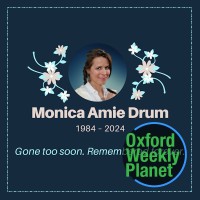 Funeral card for Monica Drum with the Oxford Weekly Planet logo overlaid in the bottom right corner
