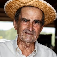 Elderly man in a straw hat