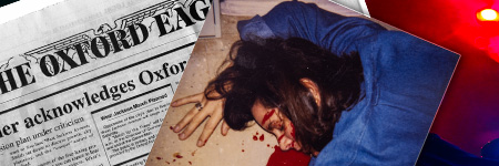 A brunette woman face down in a pool of blood with a newspaper in the background