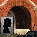 Entrance to the Yoknapatawpha County Coroner's Office with the label 'Female Victim'