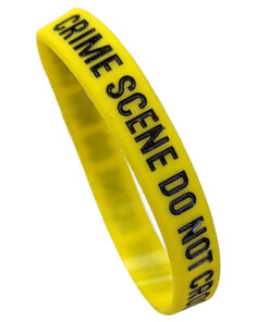yellow wrist band with CRIME SCENE DO NOT CROSS printed in bl;ack